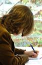 A student making notes